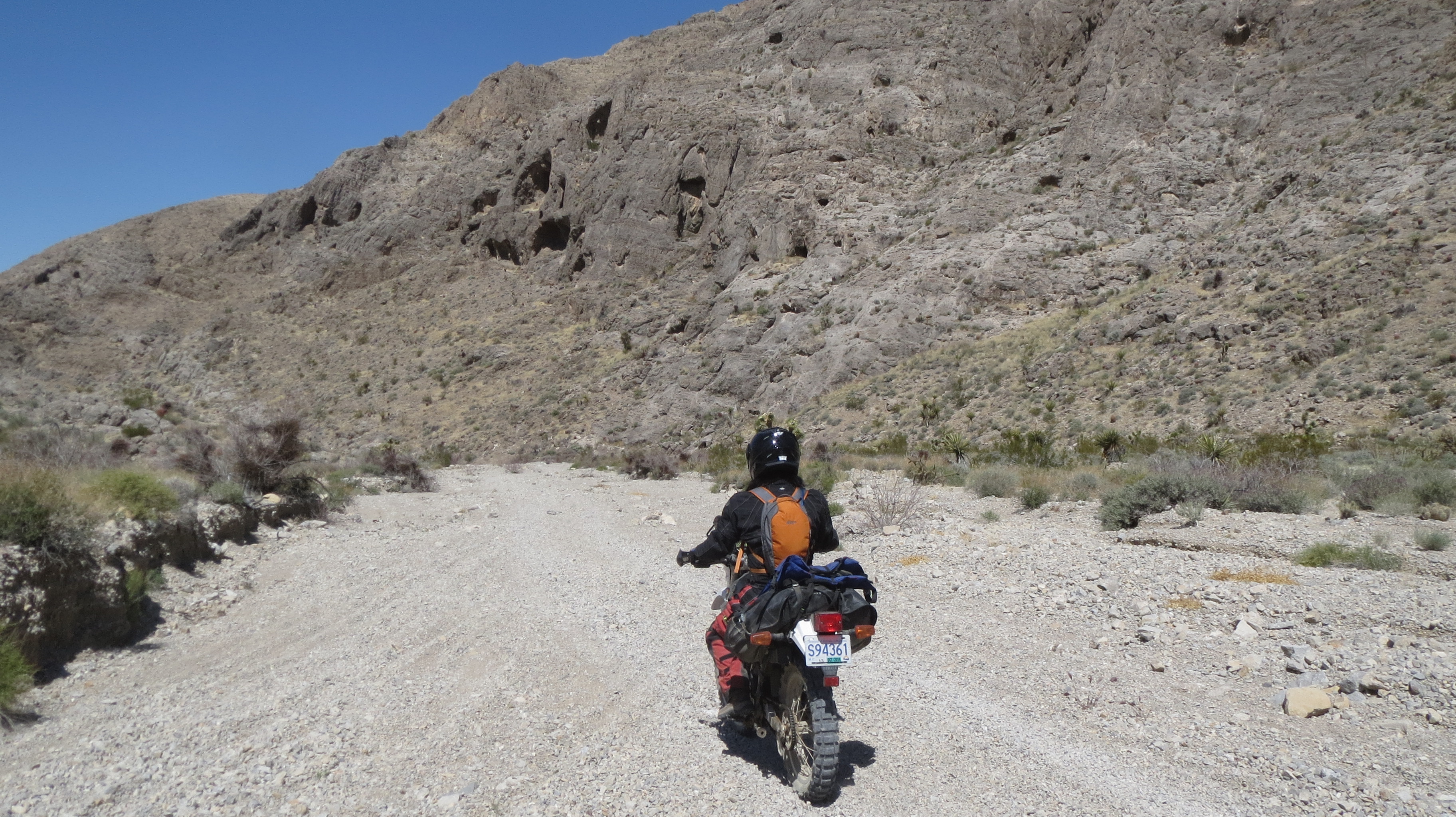 adventure rider entering canyon